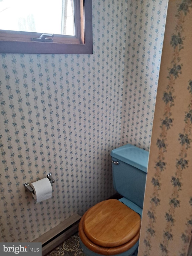 bathroom featuring toilet