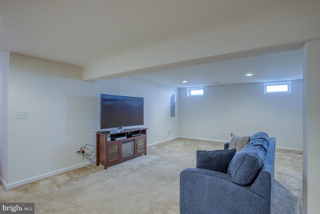 living area with carpet floors, recessed lighting, baseboards, and electric panel