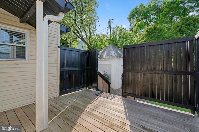 5310 Brabant Rd, Baltimore, MD 21229 - wooden deck with a storage shed, an outbuilding, and fence