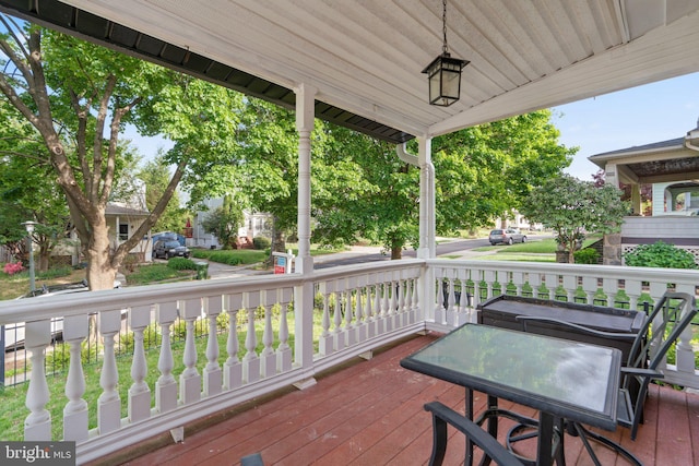 deck with covered porch