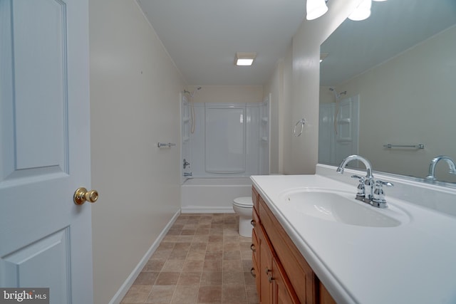 bathroom featuring toilet, baseboards, bathing tub / shower combination, and vanity