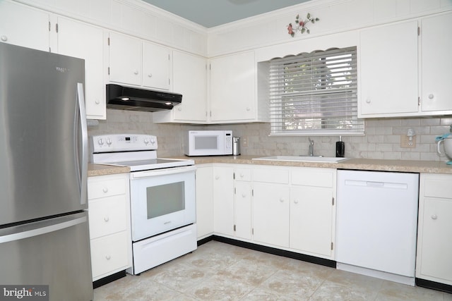 2426 Mount Pleasant Rd, Mount Joy, PA 17552 - kitchen featuring white appliances, under cabinet range hood, a sink, ornamental molding, and backsplash