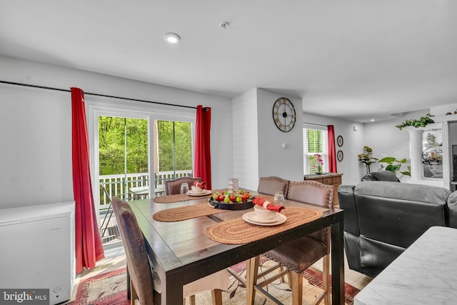 dining room featuring recessed lighting
