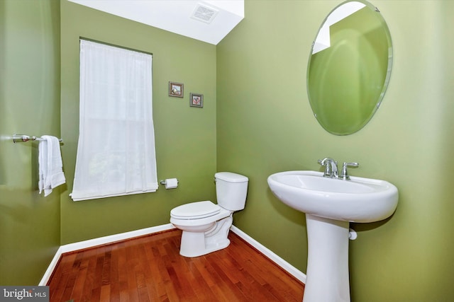 9743 Wyndham Dr, Frederick, MD 21704 - bathroom with baseboards, wood finished floors, and toilet
