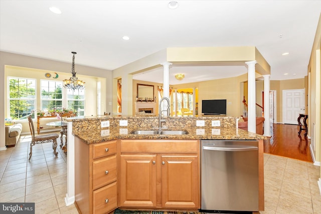 9743 Wyndham Dr, Frederick, MD 21704 - kitchen with dishwasher, a sink, open floor plan, light tile patterned floors, and recessed lighting