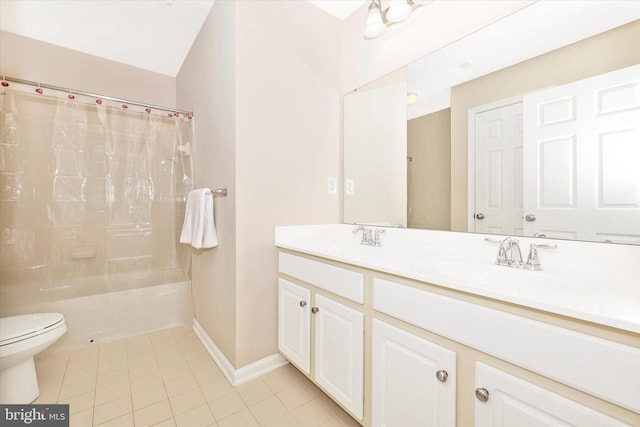 9743 Wyndham Dr, Frederick, MD 21704 - full bath with tile patterned floors, toilet, double vanity, and baseboards
