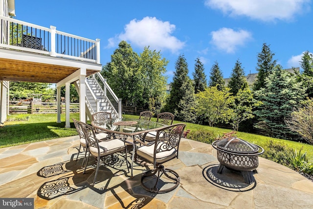 9743 Wyndham Dr, Frederick, MD 21704 - view of patio featuring a fire pit, stairs, and outdoor dining area
