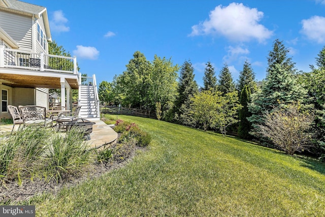 9743 Wyndham Dr, Frederick, MD 21704 - view of yard with stairs, a deck, and a patio