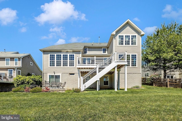 9743 Wyndham Dr, Frederick, MD 21704 - back of property featuring stairs, a wooden deck, and brick siding