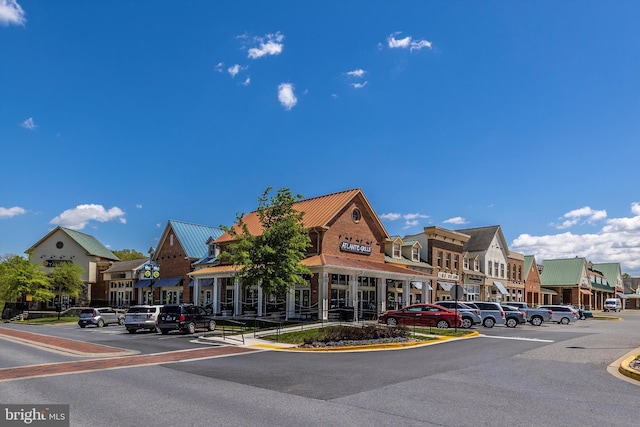 9743 Wyndham Dr, Frederick, MD 21704 - view of building exterior featuring uncovered parking and a residential view