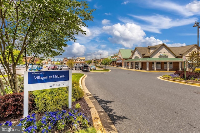 9743 Wyndham Dr, Frederick, MD 21704 - view of asphalt road with street lights and curbs
