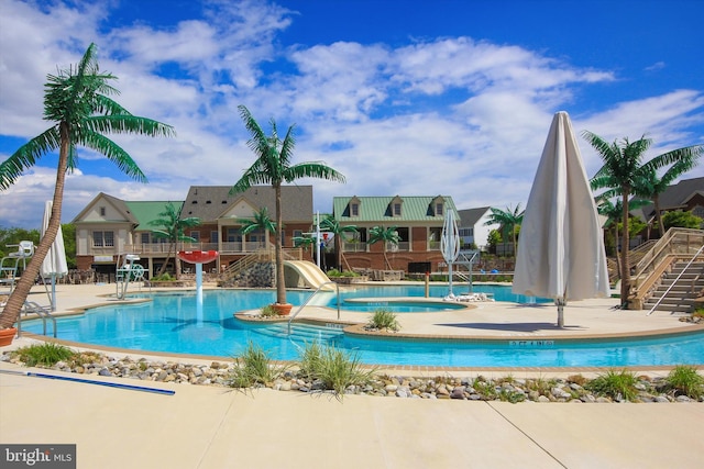 9743 Wyndham Dr, Frederick, MD 21704 - community pool with a water slide and a patio