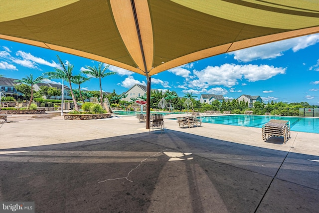 9743 Wyndham Dr, Frederick, MD 21704 - community pool featuring a patio