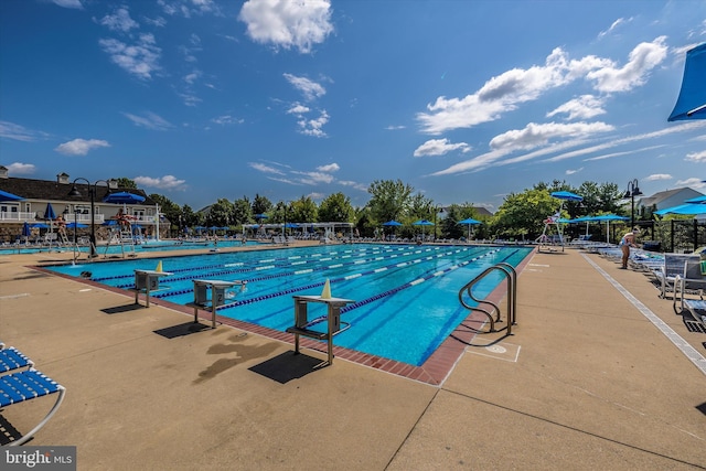 9743 Wyndham Dr, Frederick, MD 21704 - community pool featuring fence and a patio area