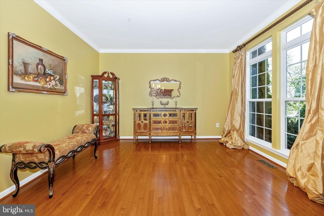 9743 Wyndham Dr, Frederick, MD 21704 - sitting room featuring wood finished floors, crown molding, and baseboards