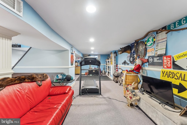 interior space with carpet flooring, recessed lighting, and visible vents