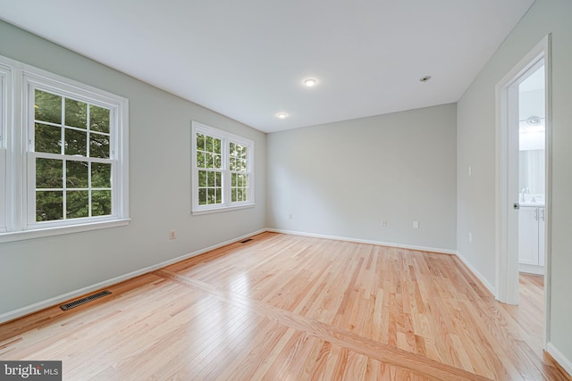 2 S Manchester St S, Arlington, VA 22204 - spare room with wood finished floors and baseboards