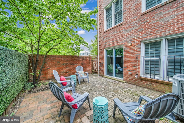 2 S Manchester St S, Arlington, VA 22204 - fenced backyard featuring a patio area and central AC unit
