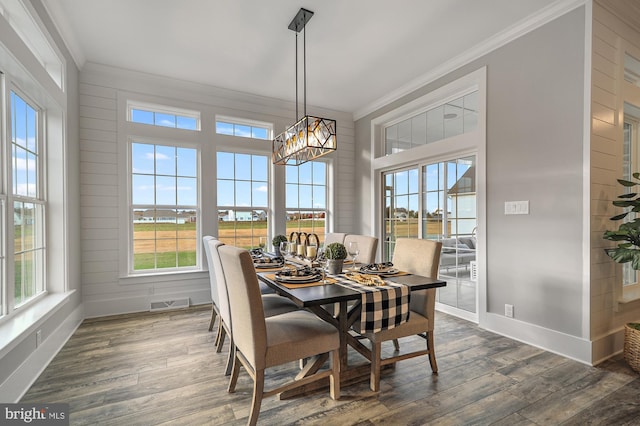 404 Wiggins Mill Rd, Townsend, DE 19734 - dining space featuring plenty of natural light, baseboards, ornamental molding, and dark wood-style flooring