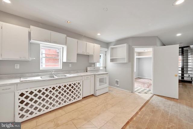 kitchen with white electric stove, visible vents, light countertops, recessed lighting, and white cabinetry