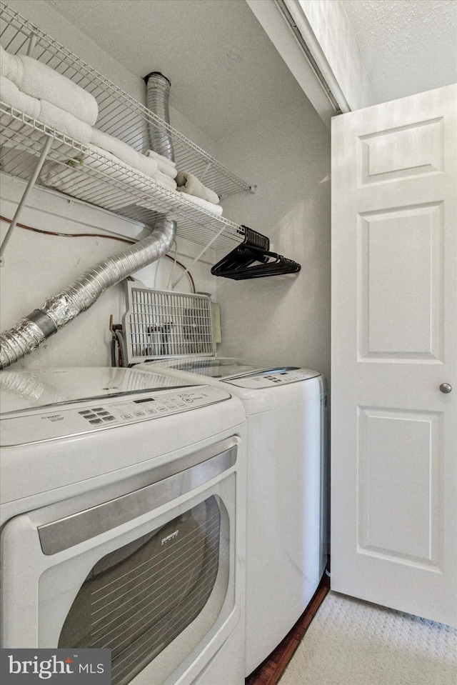 laundry area featuring laundry area and independent washer and dryer