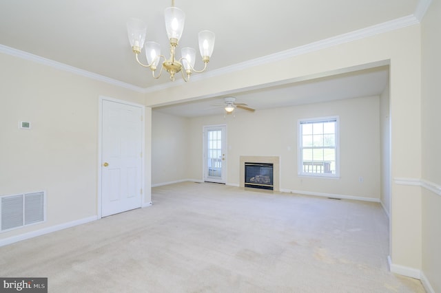 unfurnished living room featuring baseboards, visible vents, and carpet
