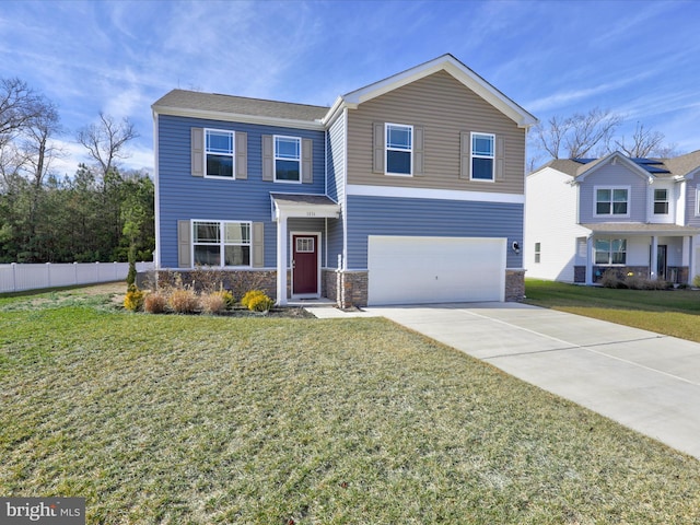 view of front of home featuring fence, a front lawn, concrete driveway, an attached garage, and stone siding