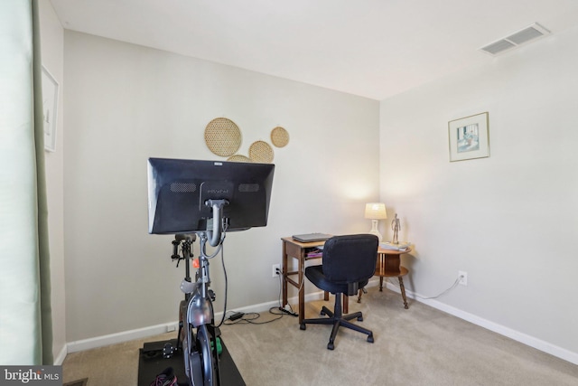 office with carpet, baseboards, and visible vents