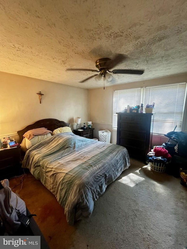 6404 Snowman Ct, Columbia, MD 21045 - bedroom with ceiling fan, carpet flooring, and a textured ceiling