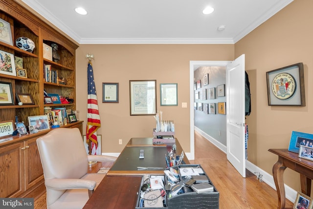 home office featuring light wood-type flooring, ornamental molding, baseboards, and recessed lighting