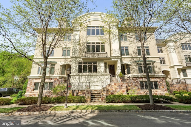 view of property with stairs