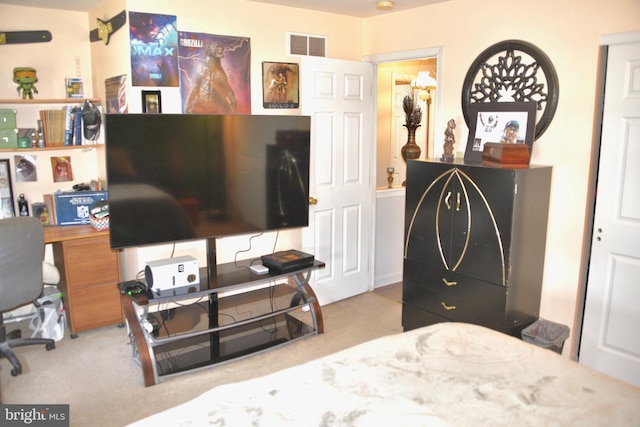 bedroom featuring visible vents and carpet