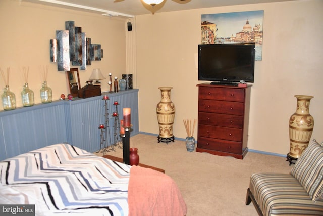 bedroom featuring carpet floors and baseboards