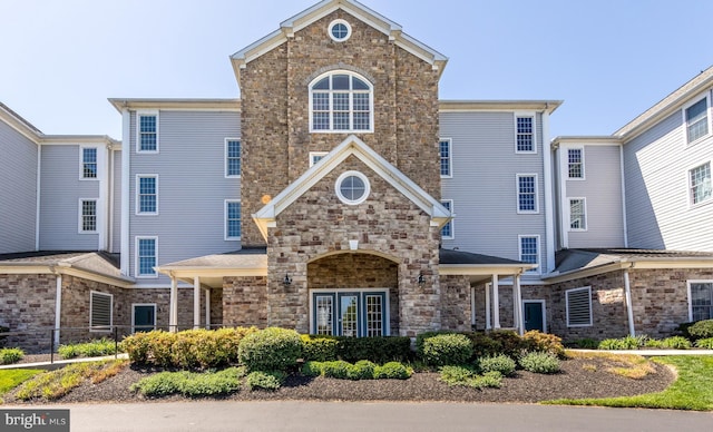 view of front of property with stone siding
