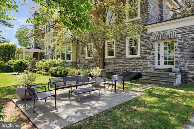 view of patio / terrace featuring an outdoor hangout area and entry steps