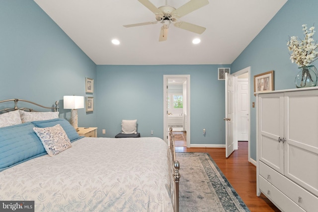 bedroom featuring visible vents, recessed lighting, wood finished floors, and vaulted ceiling