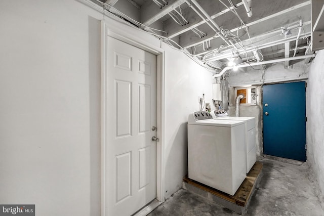 laundry area with laundry area and washing machine and dryer