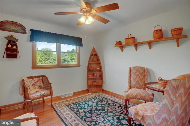 8 Roger Ave, Shippensburg, PA 17257 - sitting room featuring wood finished floors, ceiling fan, and baseboards
