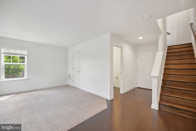 7201 Wood Pond Cir, Lanham, MD 20706 - unfurnished living room featuring stairway, baseboards, dark wood finished floors, and recessed lighting