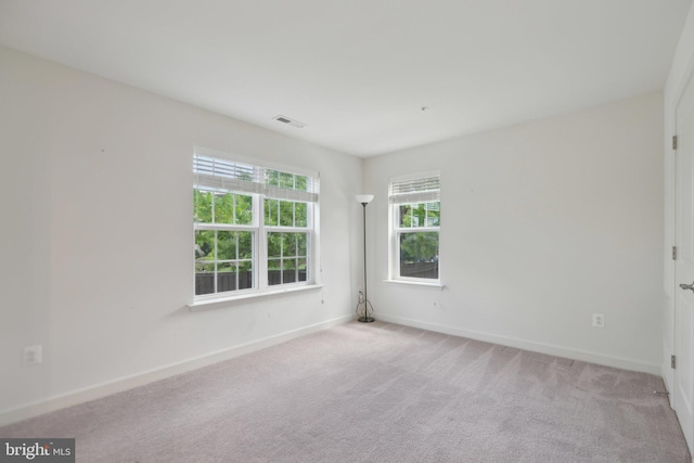 7201 Wood Pond Cir, Lanham, MD 20706 - spare room featuring carpet flooring and baseboards