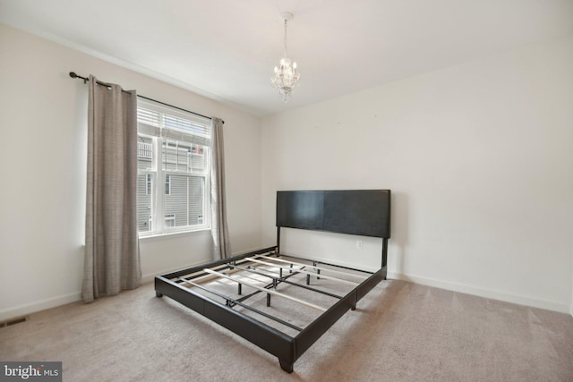 7201 Wood Pond Cir, Lanham, MD 20706 - bedroom with carpet flooring, a chandelier, and baseboards