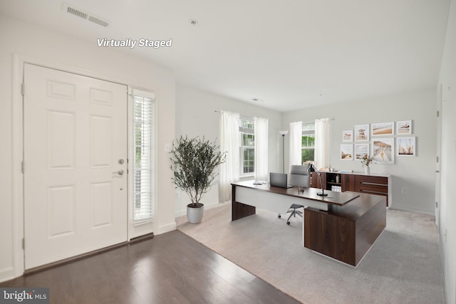 7201 Wood Pond Cir, Lanham, MD 20706 - entryway featuring wood finished floors and baseboards