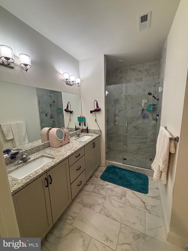 916 Holden Ct, Warminster, PA 18974 - full bathroom with visible vents, a marble finish shower, a sink, and marble finish floor
