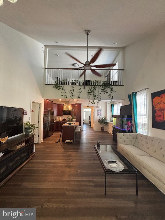 916 Holden Ct, Warminster, PA 18974 - living room featuring ceiling fan, dark wood-type flooring, and a towering ceiling