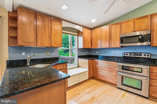 kitchen with open shelves, recessed lighting, a sink, light wood finished floors, and appliances with stainless steel finishes