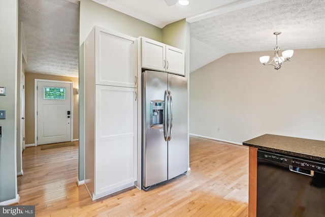 kitchen featuring white cabinetry, stainless steel fridge with ice dispenser, baseboards, black dishwasher, and light wood-style flooring