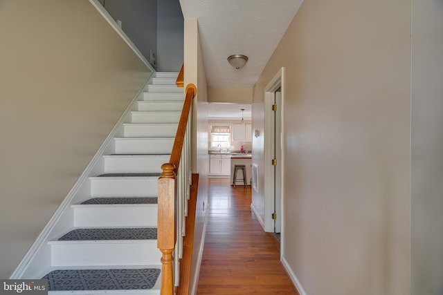 2417 Buck Hill Rd, Gerrardstown, WV 25420 - stairs with baseboards and wood finished floors