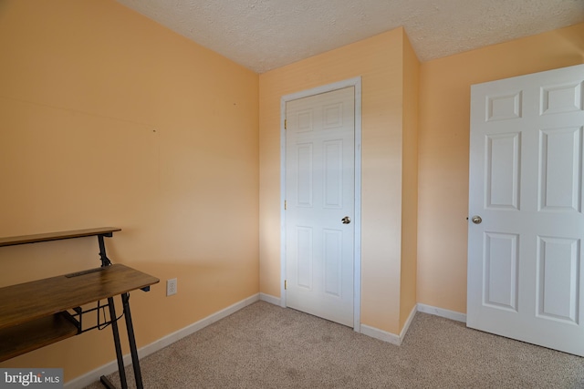 2417 Buck Hill Rd, Gerrardstown, WV 25420 - unfurnished bedroom featuring baseboards, a textured ceiling, and light carpet