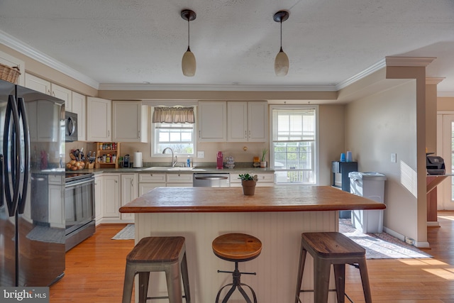 2417 Buck Hill Rd, Gerrardstown, WV 25420 - kitchen featuring stainless steel appliances, white cabinetry, and light wood finished floors