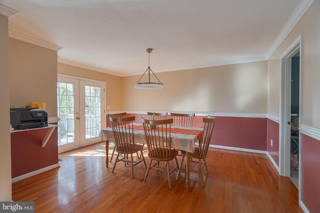2417 Buck Hill Rd, Gerrardstown, WV 25420 - dining space with crown molding, baseboards, french doors, and hardwood / wood-style floors